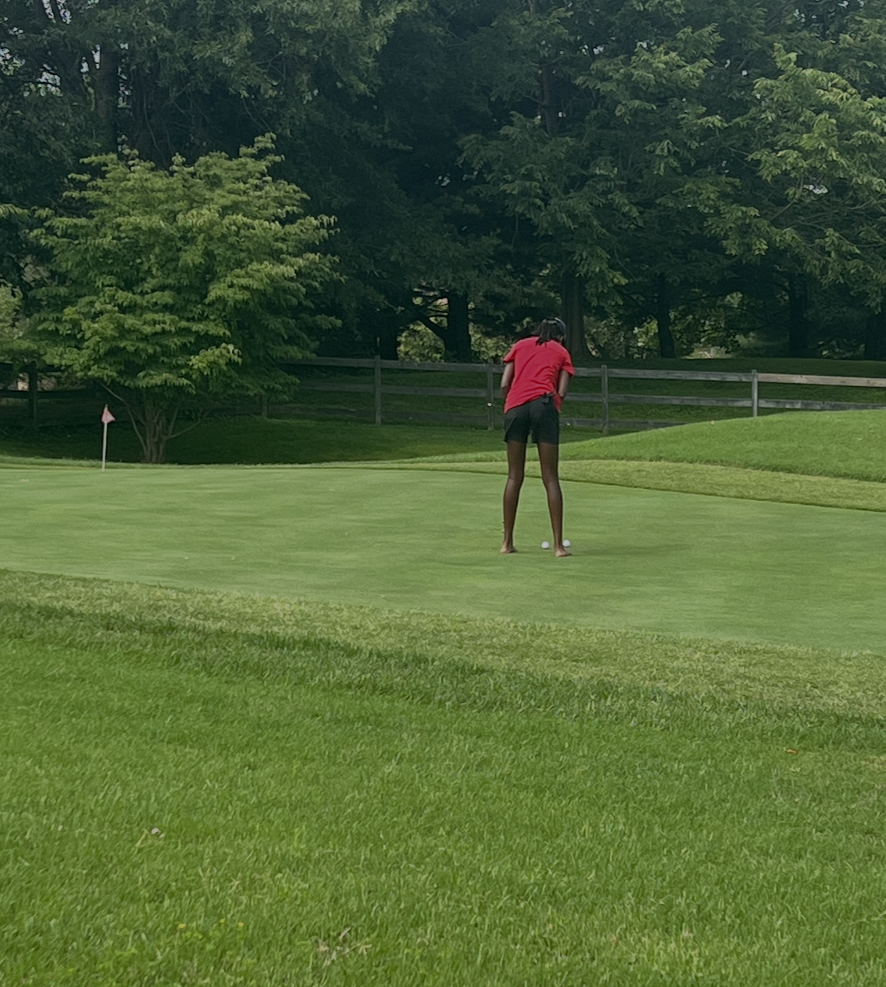 Watching the roll on a lag putt, reading what the green just gave me.